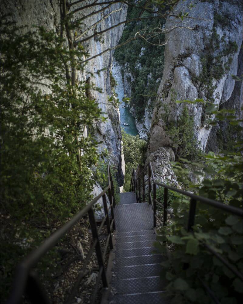 Vertiginous metal stairs at Brèche Imbert on the Blanc-Martel trail.